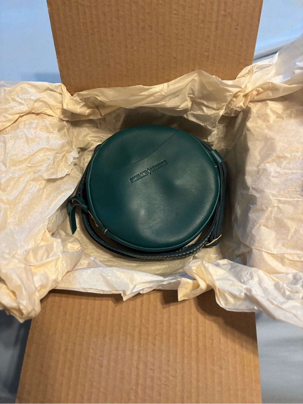 New Portland Leather Goods Small Round Peacock Leather Crossbody Bag